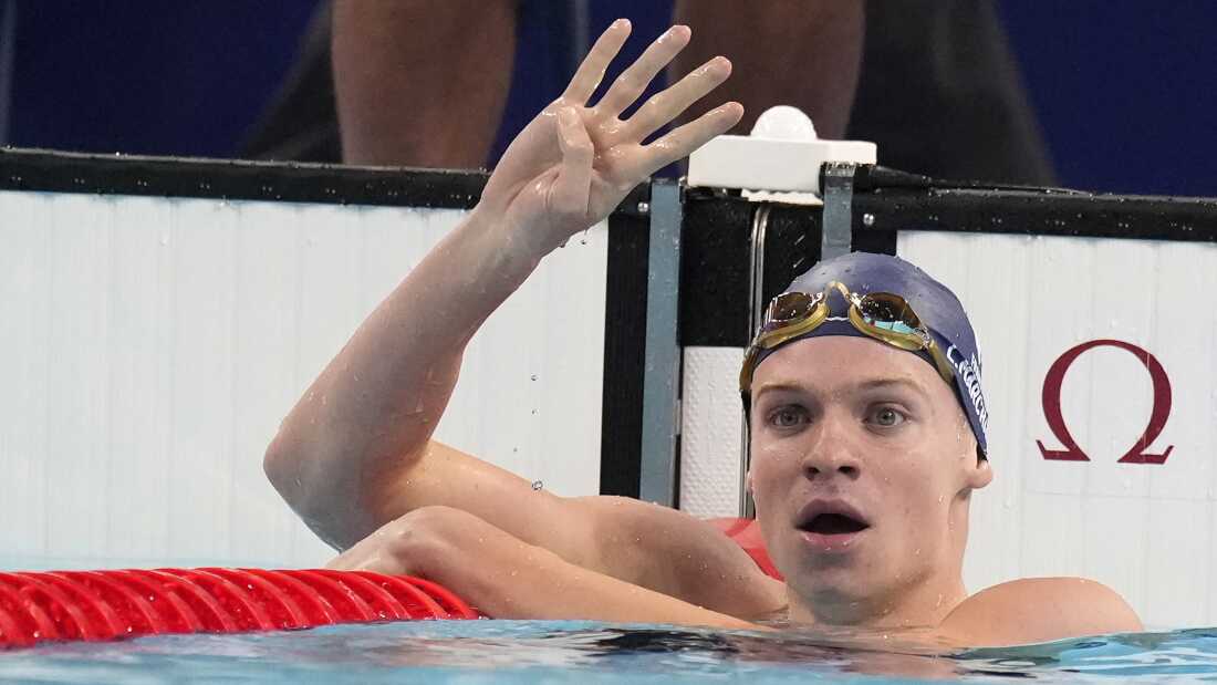 Leon Marchand of France, celebrates after winning the men's 200-meter individual medley final at the 2024 Summer Olympics