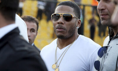 Rapper Nelly arrested in St. Louis for an alleged prior incident, not charged with drug possesion despite ecstasy pills found