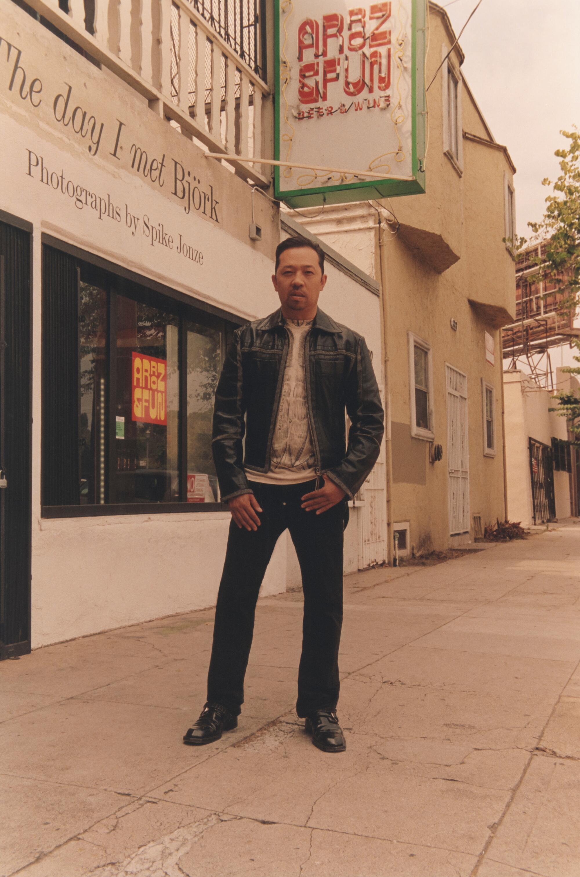 Humberto Leon poses outside of Arroz & Fun.