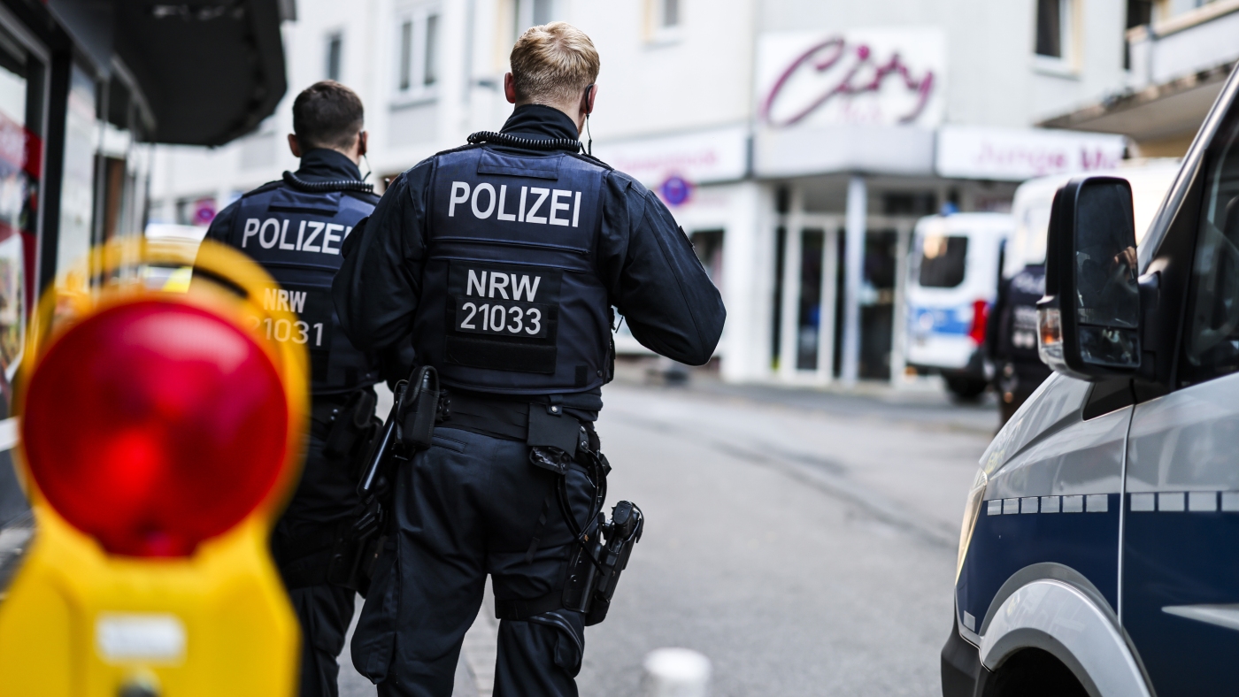 German police detain a suspect in knife attack that killed 3 : NPR