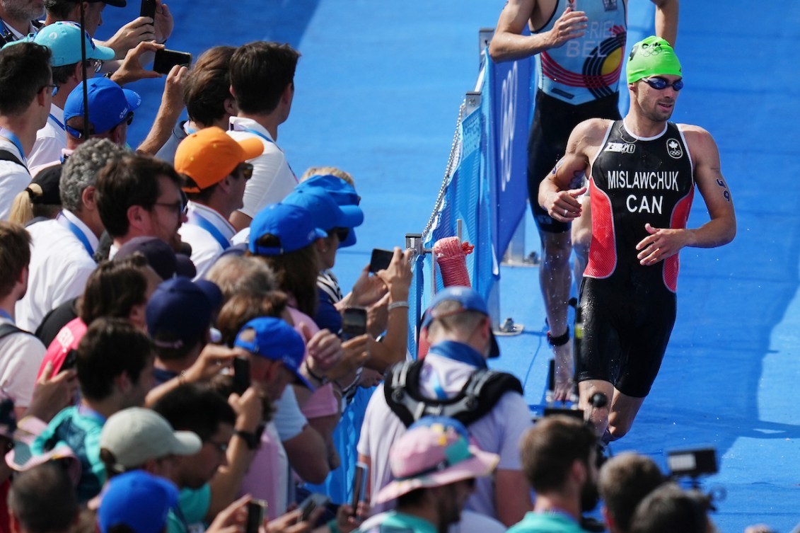 Tyler Mislawchuk runs during the triathlon