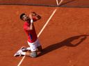 Novak Djokovic of Team Serbia celebrates match point during the Men's Singles Gold medal match against Carlos Alcaraz of Team Spain on day nine of the Olympic Games Paris 2024 at Roland Garros on August 04, 2024 in Paris, France.