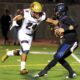 THE MAN WITH THE GOLDEN CLEATS—Zach Charbonnet, left, sacks Westlake QB Jake Kaplinski for Oaks Christian High’s football team on Nov. 3, 2017. Charbonnet, a Camarillo native, is a second-year NFL running back with the Seattle Seahawks. ROB VARELA/Acorn Newspapers