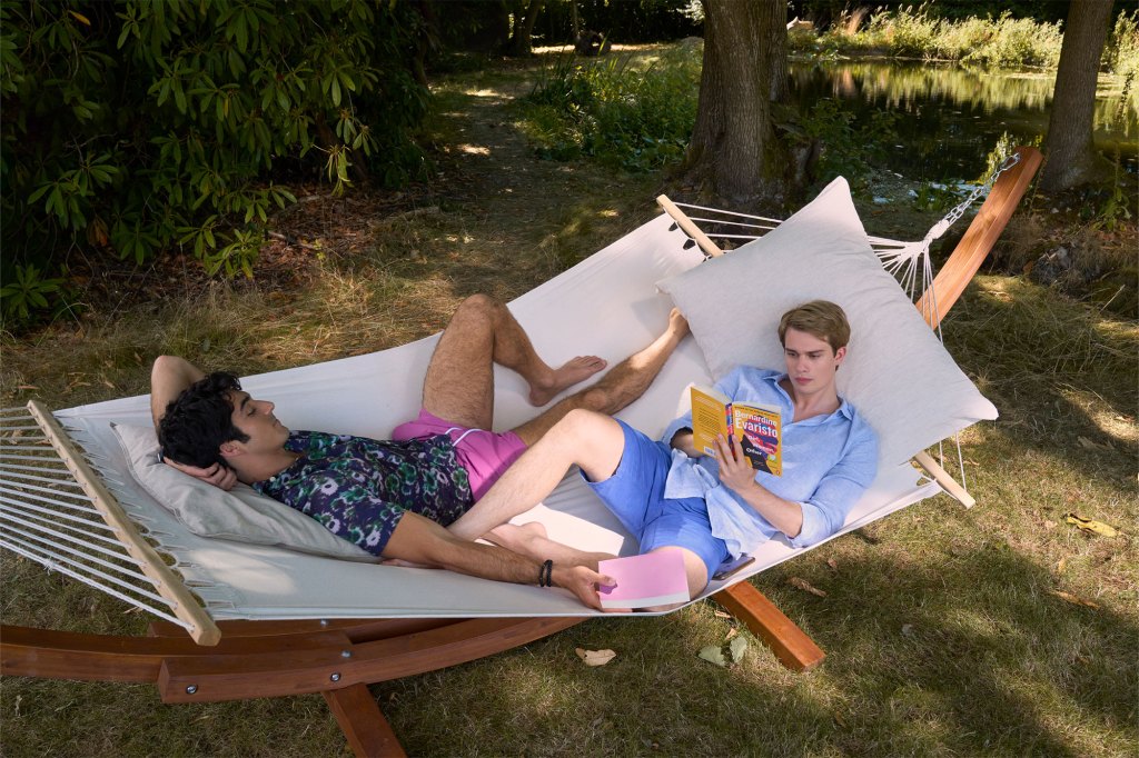 Two men relaxing in a hammock