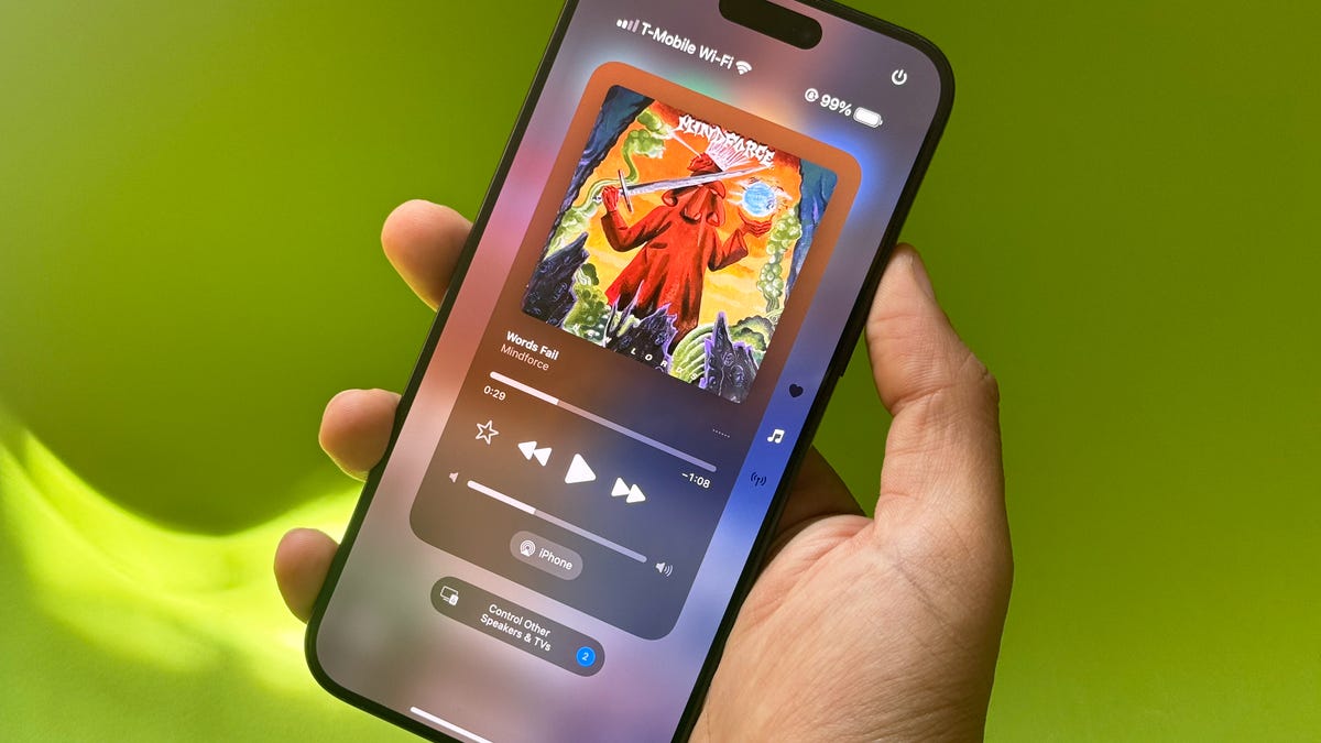 iOS 18 on iPhone with green background