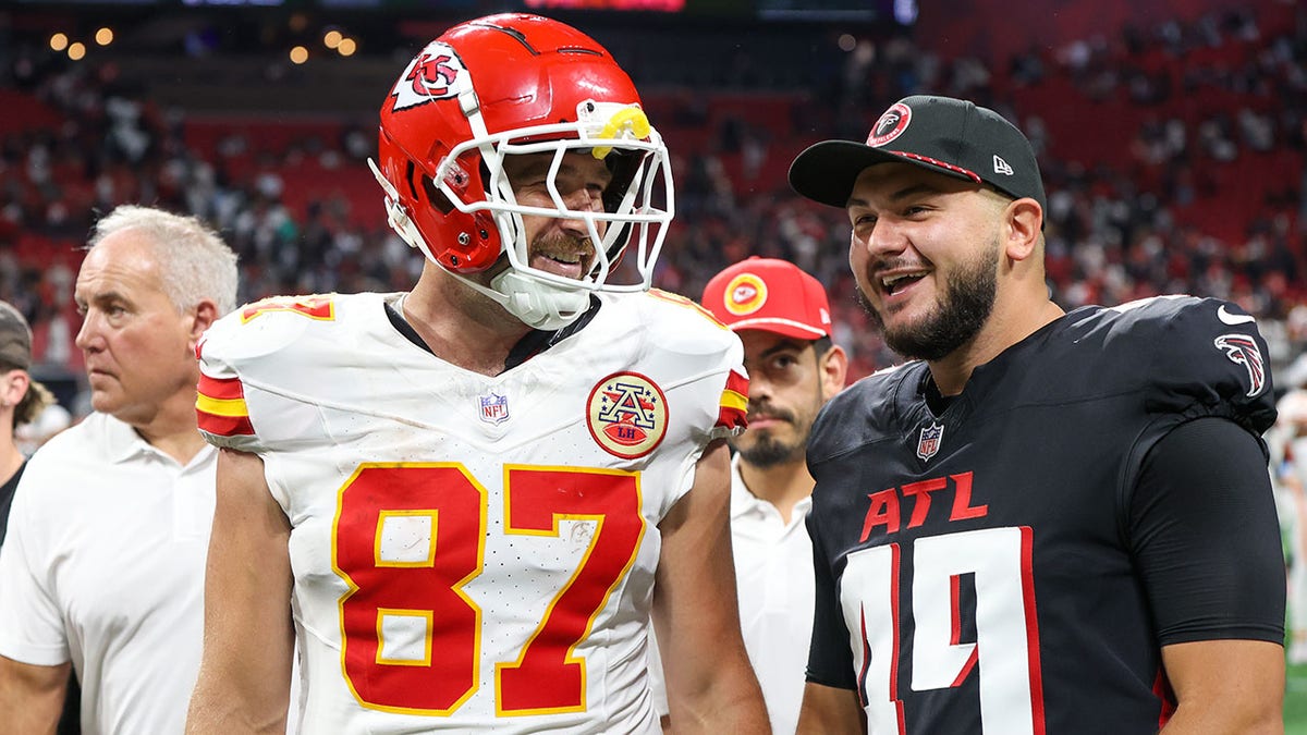 Travis Kelce talks to Liam McCullough