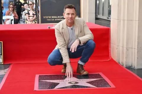 Getty Images Ewan McGregor with his star on the Hollywood Walk of Fame