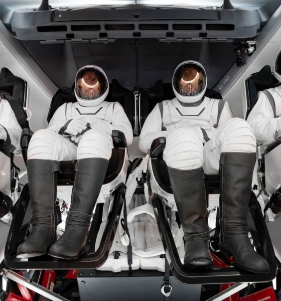 The four-person crew of the Polaris Dawn mission pictured wearing their SpaceX extravehicular activity suits