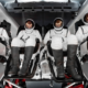 The four-person crew of the Polaris Dawn mission pictured wearing their SpaceX extravehicular activity suits