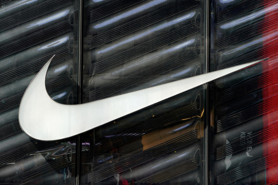 FILE PHOTO: The Nike swoosh logo is seen outside the store on 5th Ave in New York, New York, U.S., March 19, 2019.   REUTERS/Carlo Allegri/File Photo