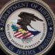 The Justice Department seal is seen on the lectern during a Hate Crimes Subcommittee summit on June 29, 2017 in Washington, DC. (Mark Wilson / Getty Images via CNN Newsource)