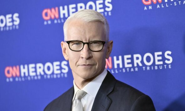 Anderson Cooper hit with hurricane debris during live shot