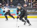 Brady Tkachuk skates with the puck in Gatineau.