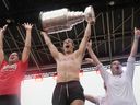 Nick Cousins raises the Stanley Cup during a parade and rally for the Florida Panthers on Sunday, June 30, 2024, in Fort Lauderdale, Fla.