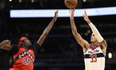 Boucher has 22 points for Raptors in loss to Wiz