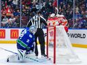 Jonathan Huberdeau of the Flames celebrates after scoring against the Canucks on Wednesday at Rogers Arena.