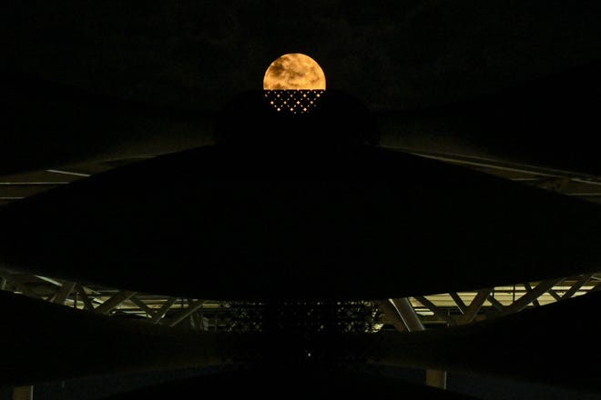 A hunter's moon rises over the the Basra International Stadium in Iraq on October 17, 2024.