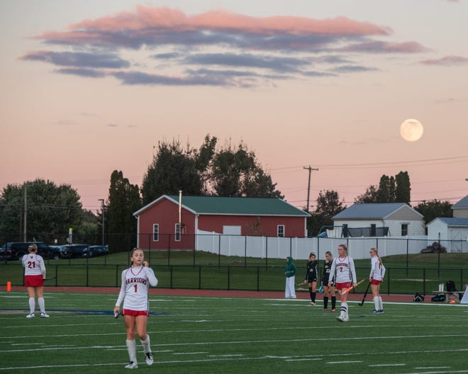 A nearly full moon rises in the second quarter of a YAIAA semifinal in New Oxford, Pennsylvania on Wednesday, Oct. 16, 2024.