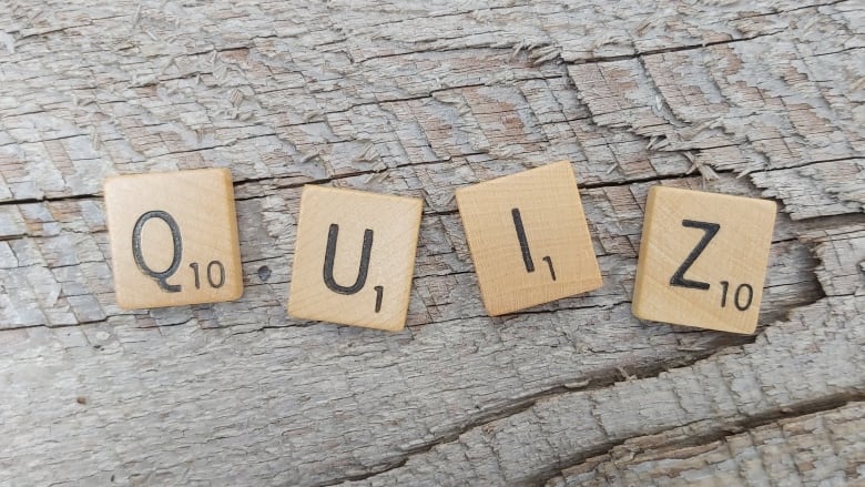 Four Scrabble tiles spelling the word 