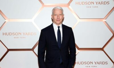 Anderson Cooper hit by debris