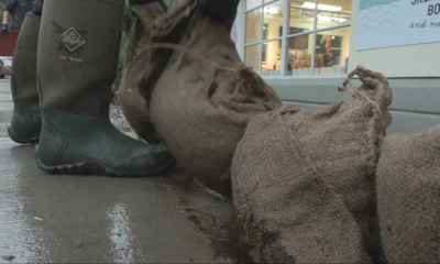 Deep Cove businesses cleaning up after flood