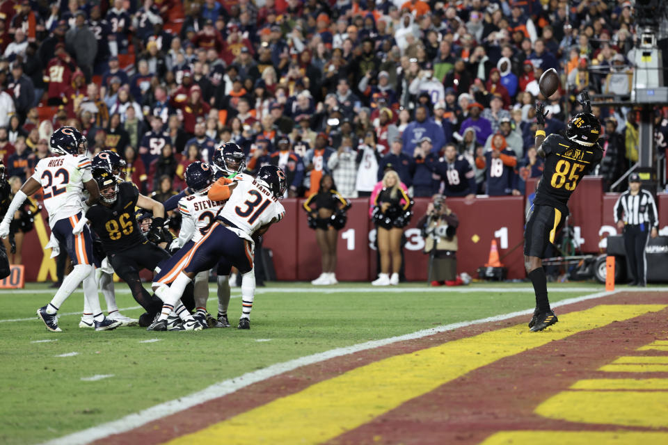 LANDOVER, MARYLAND - OCTOBER 27: Noah Brown #85 of the Washington Commanders catches a game winning touchdown pass against the Chicago Bears at Northwest Stadium on October 27, 2024 in Landover, Maryland. (Photo by Scott Taetsch/Getty Images)