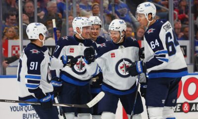 Jets remain undefeated, edge Blues for 6th straight win