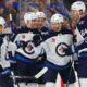 Jets remain undefeated, edge Blues for 6th straight win