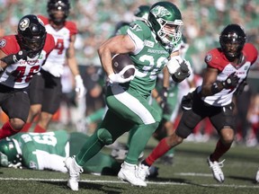 Saskatchewan Roughriders running back Thomas Bertrand-Hudon (30) runs the ball during the second half of CFL action at Mosaic Stadium on Saturday, September 28, 2024 in Regina.