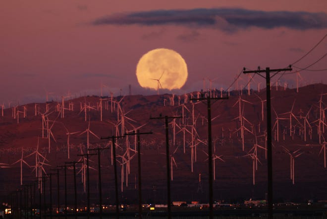 A hunter's moon sets over Mojave, California on October 17, 2024.