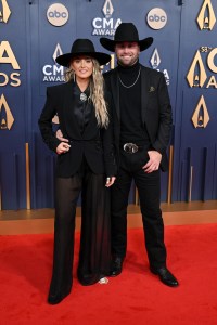 Lainey Wilson, Duck Hodges at The 58th Annual CMA Awards at Bridgestone Arena on November 20, 2024 in Nashville, Tennessee.