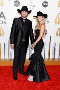 NASHVILLE, TENNESSEE - NOVEMBER 08: EDITORIAL USE ONLY (L-R) Devlin Hodges and Lainey Wilson attend the 57th Annual CMA Awards at Bridgestone Arena on November 08, 2023 in Nashville, Tennessee. (Photo by Jason Kempin/Getty Images)