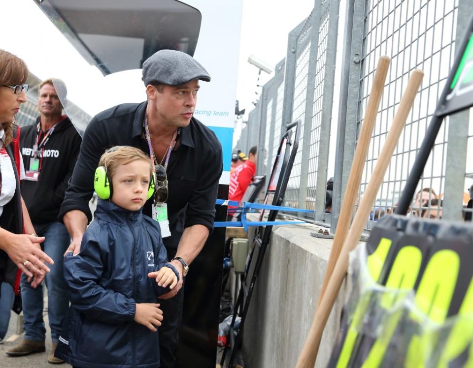 Brad Pitt with his son Knox at the MotoGP British Grand Prix race in 2015. WireImage