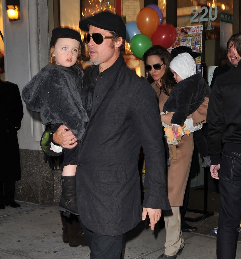 Brad Pitt and Angelina Jolie with their kids Vivienne and Knox in NYC in December 2010. WireImage