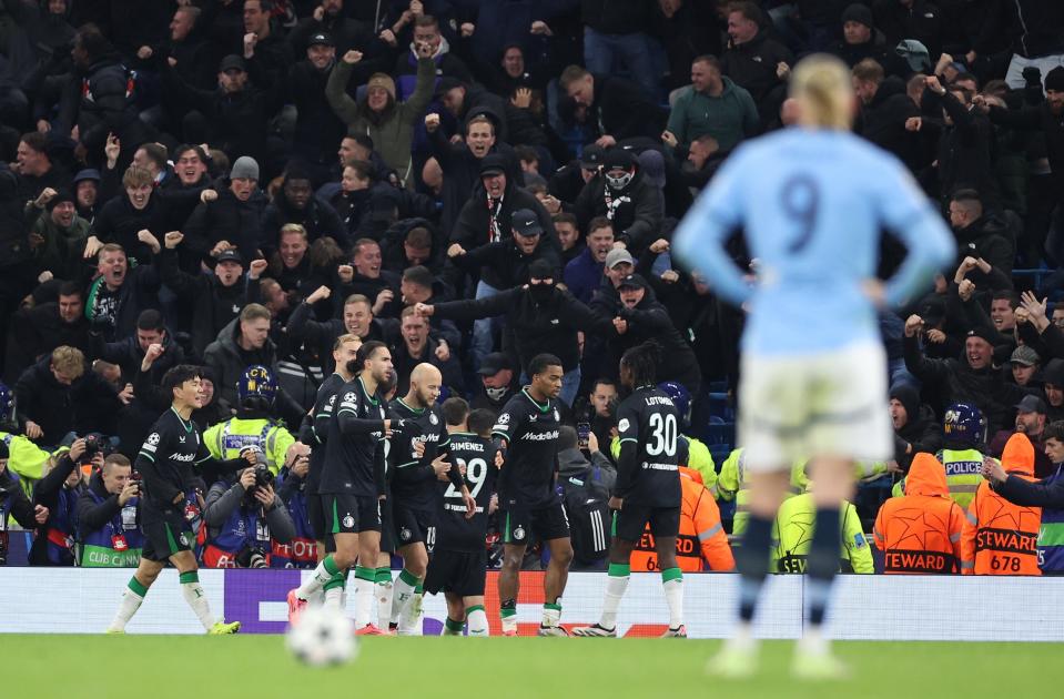 Erling Haaland watches on as Feyenoord celebrate (EPA)