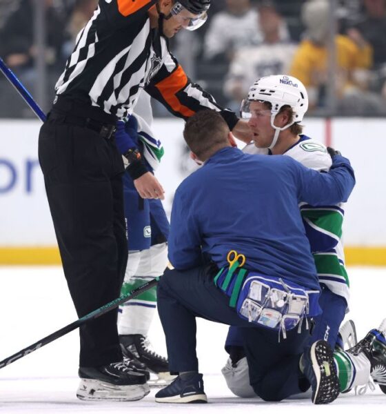 Canucks' Boeser leaves vs. Kings after illegal check to head