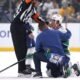 Canucks' Boeser leaves vs. Kings after illegal check to head