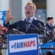 In this March 26, 2019, file photo former California Gov. Arnold Schwarzenegger speaks at a rally calling for "Fair Maps" at the Supreme Court in Washington. (AP Photo/Carolyn Kaster)