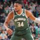 Giannis Antetokounmpo sits after pregame knee issue; Bucks win