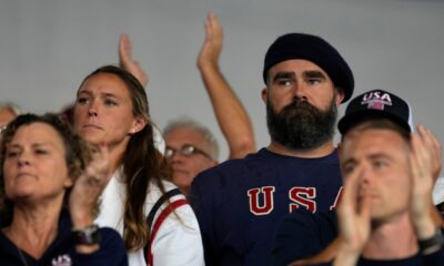 Recently retired Philadelphia Eagles lineman Jason Kelce and wife Kylie watch a women's field hockey match Saturday, July 27, 2024, in Colombes, France. (AP Photo/Anjum Naveed)