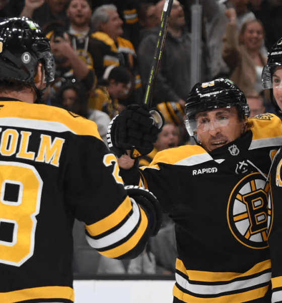 Marchand scores late in OT, Bruins recover to defeat Flames