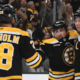 Marchand scores late in OT, Bruins recover to defeat Flames