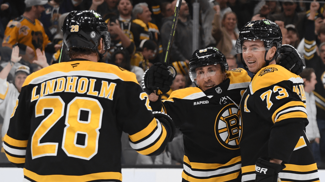 Marchand scores late in OT, Bruins recover to defeat Flames