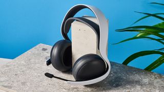 A black and white Sony PlayStation Pulse Elite wireless gaming headset for PS5 and PS Portal