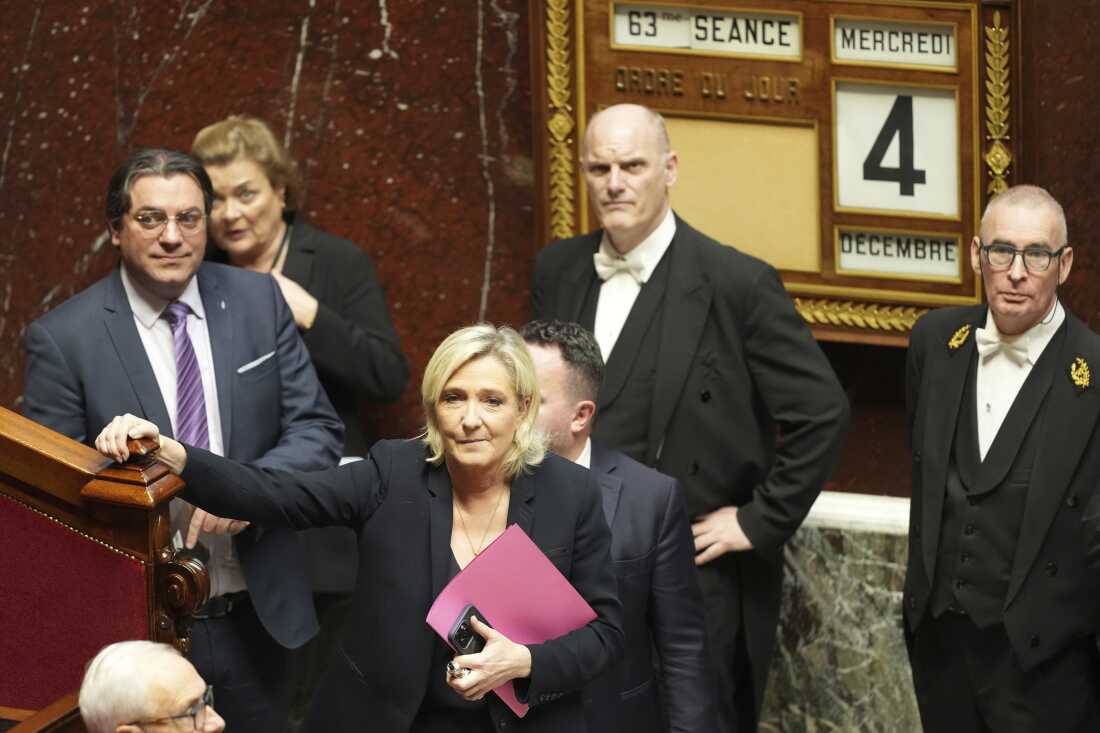 French far-right leader Marine Le Pen arrives to deliver her speech at the National Assembly prior to a no-confidence vote in the National Assembly in Paris.