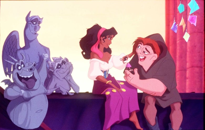 Quasimodo, Esmerelda and the gargoyles in a screenshot from The Hunchback of Notre Dame animated film.