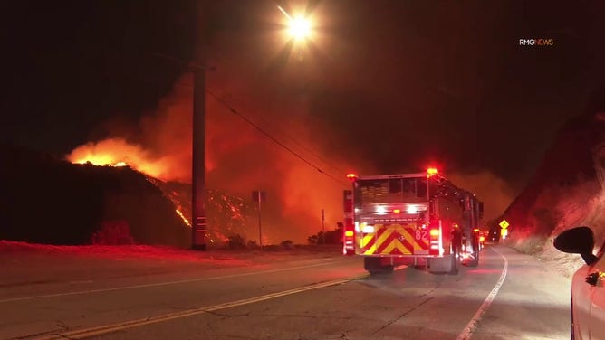 This photo shows crews racing to the scene of the Franklin Fire in Malibu outside Los Angeles.