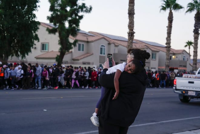 A young girl rests as the Virgen de Guadalupe pilgrimage makes its way though Indio, Calif., Dec. 12, 2024.