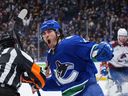 Vancouver Canucks' Kiefer Sherwood celebrates his second goal against the Colorado Avalanche during the second period of an NHL hockey game in Vancouver, on Monday, December 16, 2024.