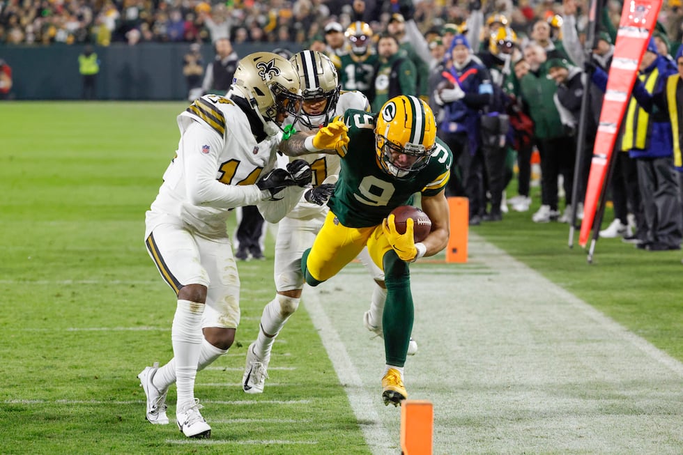 Green Bay Packers wide receiver Christian Watson (9) carries against New Orleans Saints...